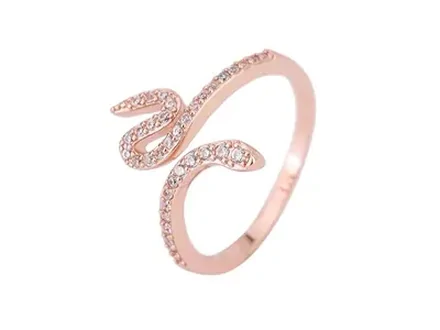 A rose gold snake-shaped ring set with small stones, on white