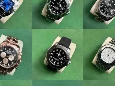 Wristwatches with steel and two-tone cases on a green background